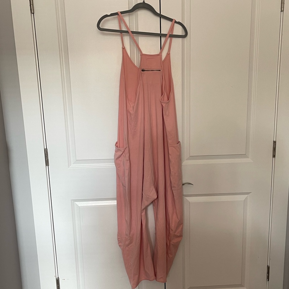 Free People fp Movement Hot Shot Onesie in pale pink NWOT